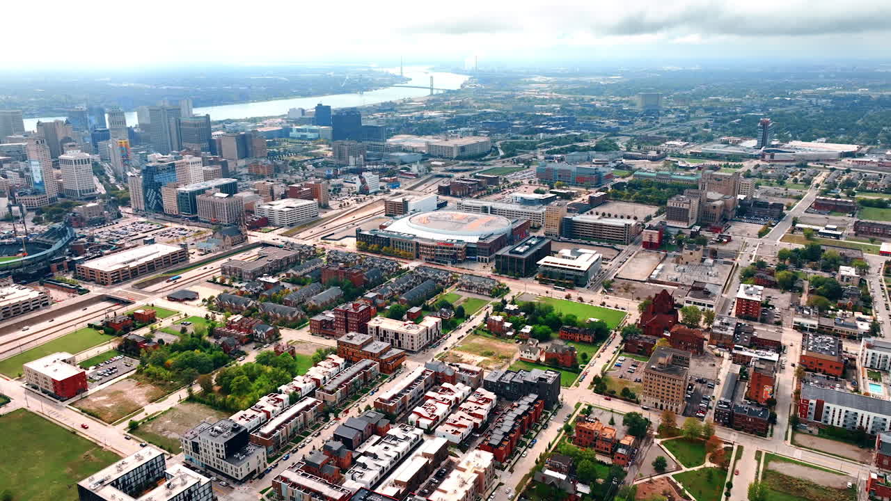 Detroit, USA, 28 July 2025: Detroit arena and neighborhoods aerial. Drone view of homes, arenas and downtown stretching toward the river