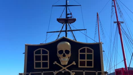 pirate ship with skull and crossbones