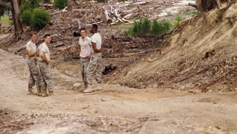 Military-soldiers-interacting-with-each-other-at-boot-camp-4k