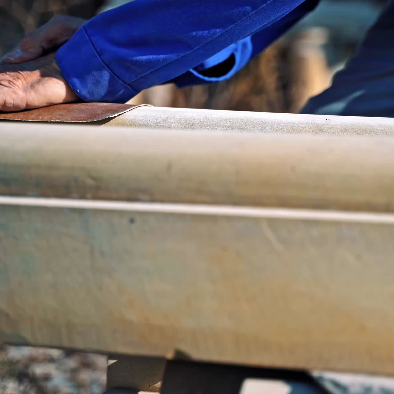 Worker polishes a stone