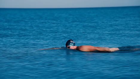 person swimming in open water