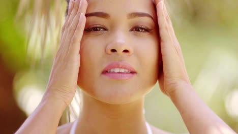 Close-up-on-beautiful-woman-with-hands-on-hair