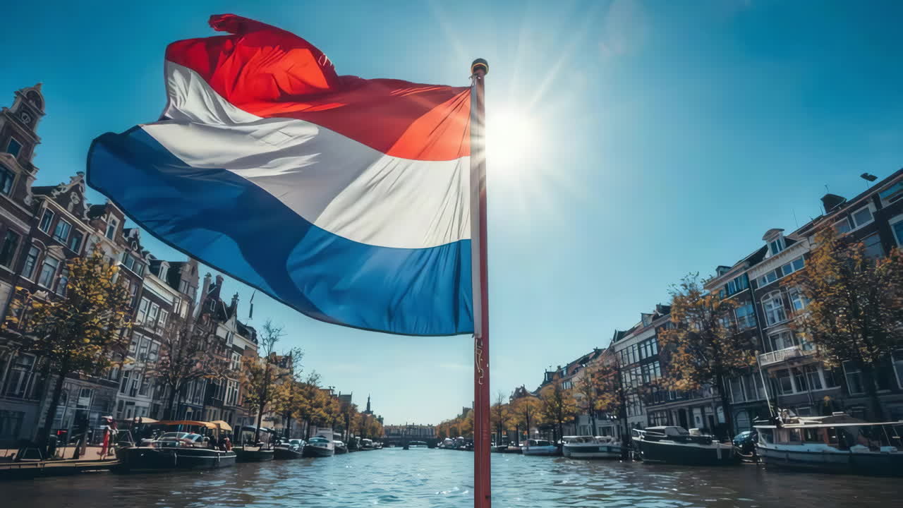 Amsterdam Canal with Dutch Flag