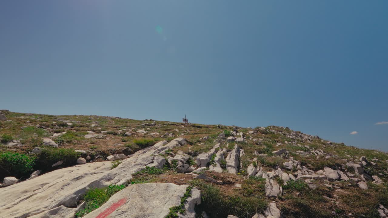 Hikers ascending Prutas in Durmitor, Montenegro, feeling adventure and freedom