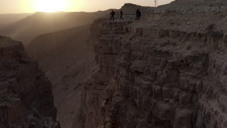 sunrise over a desert clifftop viewpoint