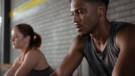 people exercising on exercise bikes