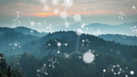 animation of connections moving over idyllic misty mountain landscape at sunset