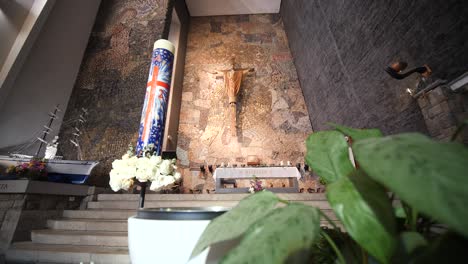 sanctuary serenity: interior glimpse of church altar with flickering candle - a tranquil exploration into sacred beauty