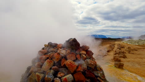 Icelandic-geothermal-fumaroles-Namafjall-walk-to-close-up-of-sulphuric-steam-vent-#2,-in-DJI-Osmi-stabilized-4k-ProRezHQ