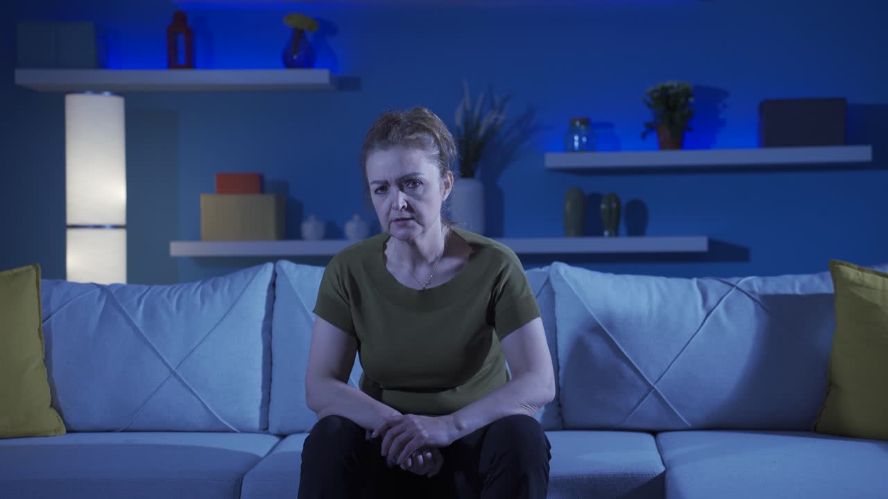 Woman looking at camera with trouble.