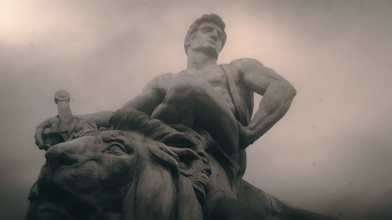 Epic, ancient stone statue on cloudy day and windy weather.