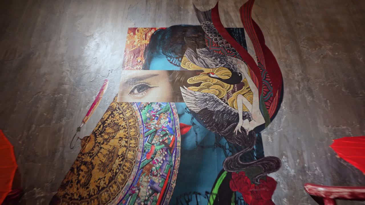 A cinematic b-roll showcases a captivating painting inside a Chinese bar, its rich colors and fine details enhancing the cultural ambiance.