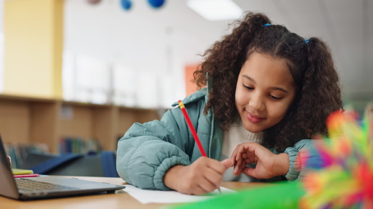 Girl learning in the library