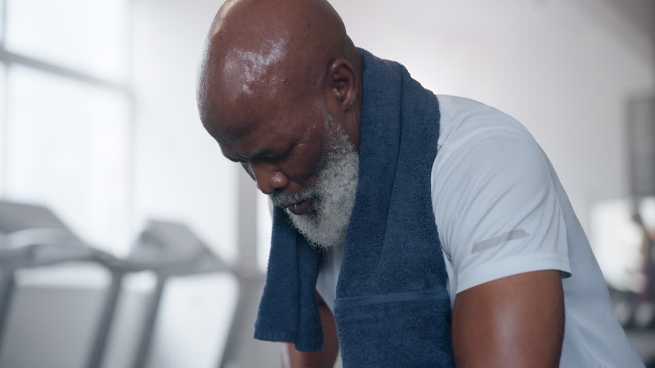 Senior man taking a break after exercise