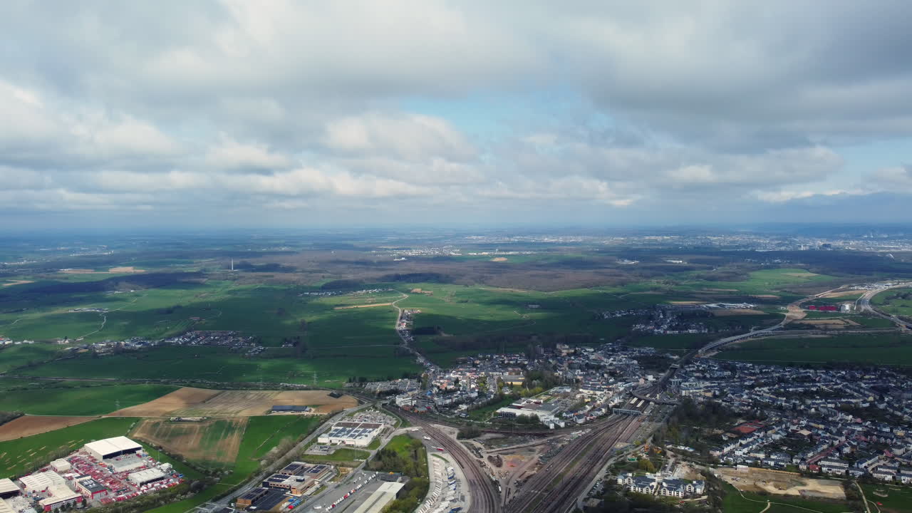 Aerial View of European Town with Fields and Infrastructure