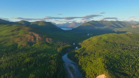 panorama of flathead river with greenery forest mountains near glacier national park in montana, usa