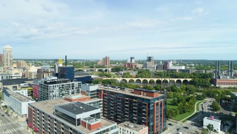 drone aerial view revealing the stone arche bridge and mississippi river