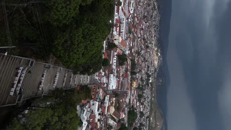 guadalupe church of san cristobal, drone flyover aerial movement, vertical establishment shot