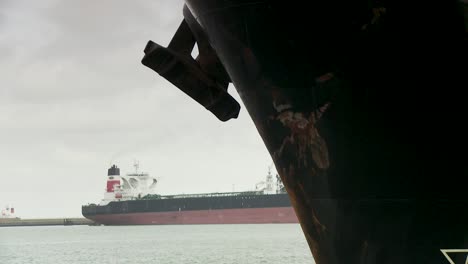 cargo ship in rotterdam port, cloudy weather, transport feeling