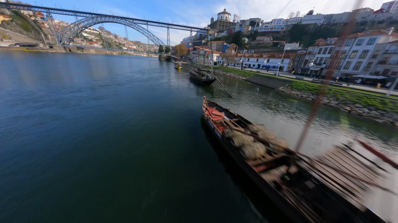 amazing European riverside town zooms FPV drone Dom Luis bridge Porto Portugal