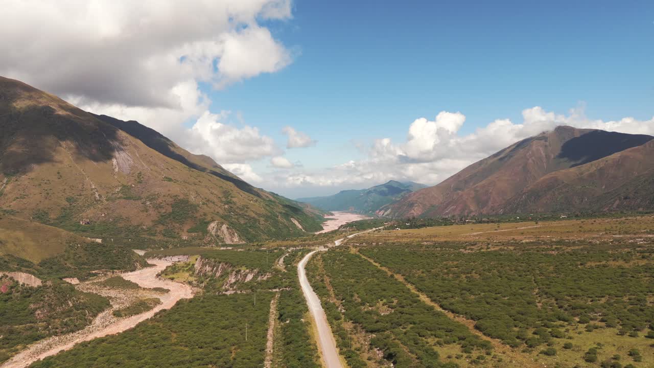 Scenic mountain valley landscape with road and river