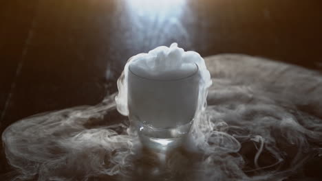 water with dry ice in a glass