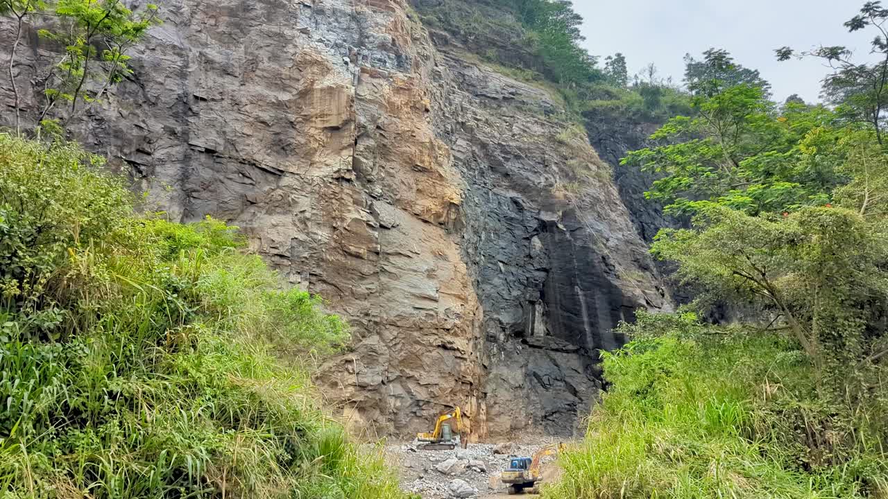 Diggers working in stone rock quarry in Kandy district of Sri Lanka
