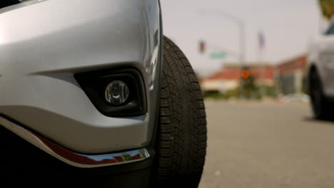 New-modern-car-parked-on-the-street-on-a-hot-summer-day