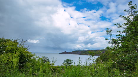 timelapse zatoki runswick, tęcza po burzy, przejaśnianie do słońca