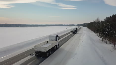 trucks on a snowy road