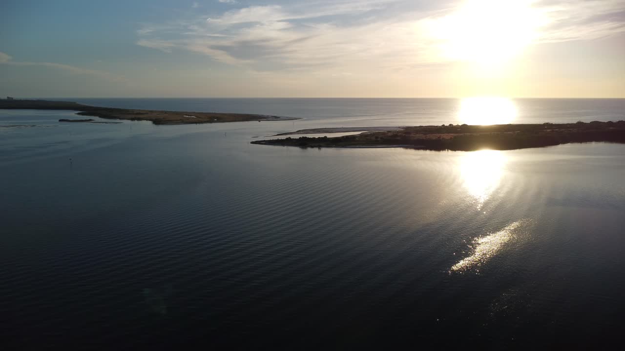 Nice slow Island push into the sun at sunset. This island is located off the coast of Honeymoon Island at the Dunedin Causeway.