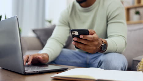 Phone,-laptop-and-man-hands-typing-while-doing