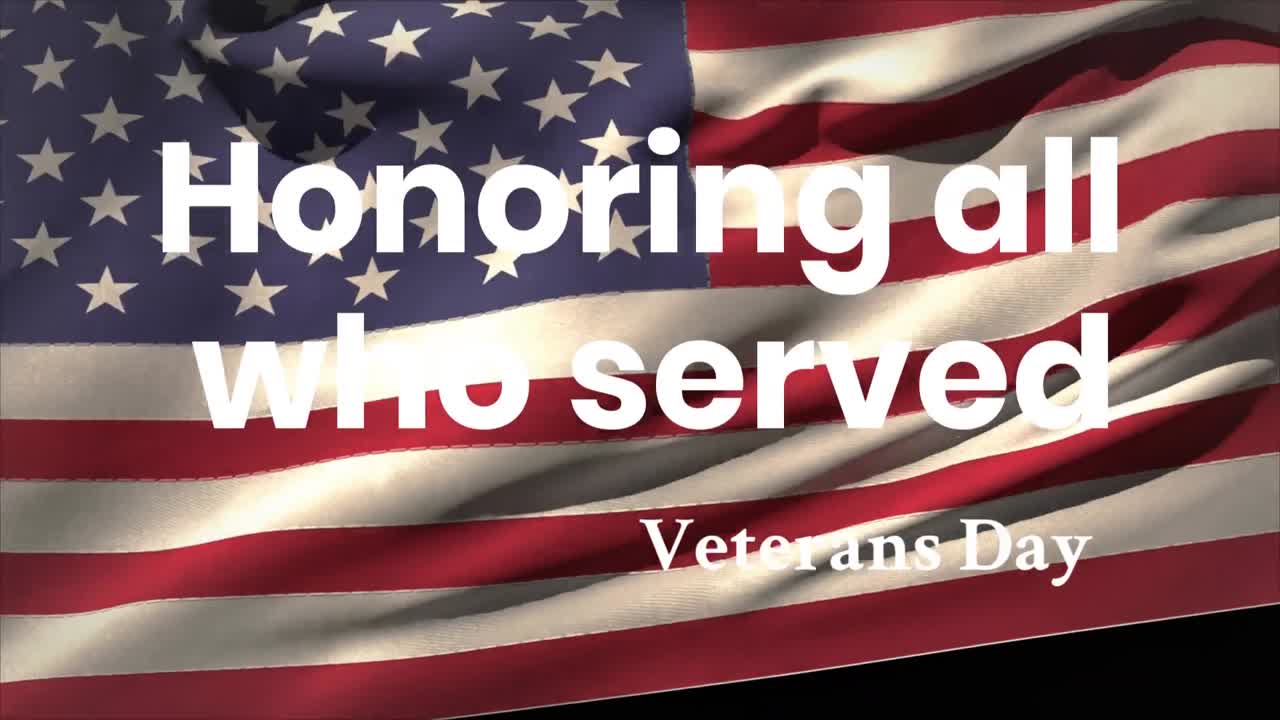 Animation of veteran's day text over hands with thumbs up and american flag