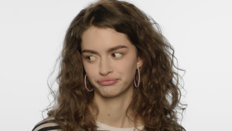 skeptical woman face expression. portrait of girl with critical expression