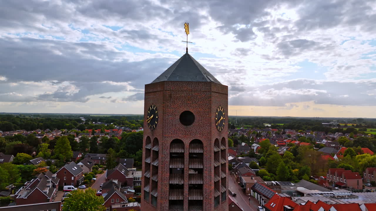 Distinctive freestanding tower known as a campanile. Distancing from a tower of Saint Lawrence Church in Vierlingsbeek, Netherlands