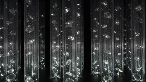 an enchanting display of bubbles and light: captivating visuals in a darkened space with glittering columns reflecting radiant sparkles and quirky shapes