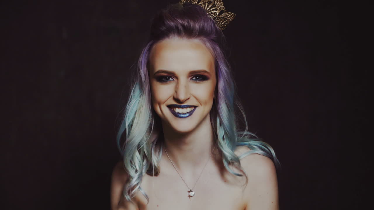 Beauty Portrait. Hairstyle. Portrait of a beautiful girl with colored hair, professional hair coloring