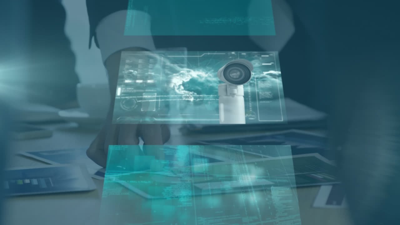 컴퓨터 화면의 애니메이션으로 카메라가 배경에서 일하는 사업가 위에 움직입니다.