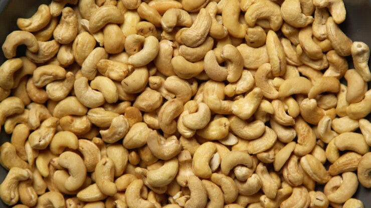 Overhead Full Frame Shot Of Cashew Nuts Revolving On Turntable Shot In Slow Motion