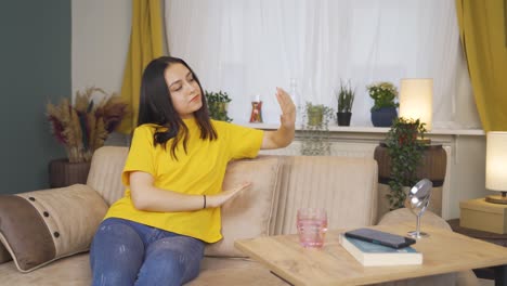 young woman caring for her nails.