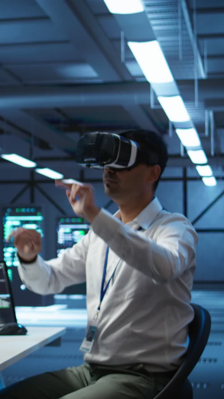 Man Wearing VR Headset Interacting in Data Center