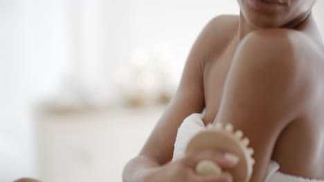 woman massaging hand in spa