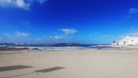 video from malta, showing the empty little armier beach at winter