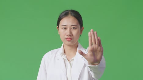 woman in lab coat rejecting