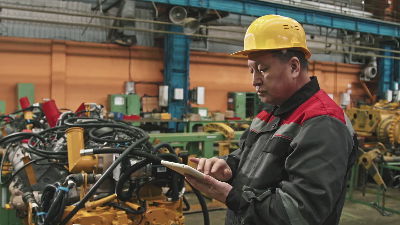 Plant Supervisor Inspecting Machinery Equipment
