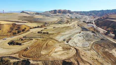 Aerial-over-a-massive-vast-giant-tract-home-contruction-project-development-in-the-hills-above-Santa-Clarita-California-suggests-Los-Angeles-urban-sprawl