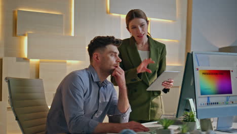 professional designers developing project in creative agency. woman checking