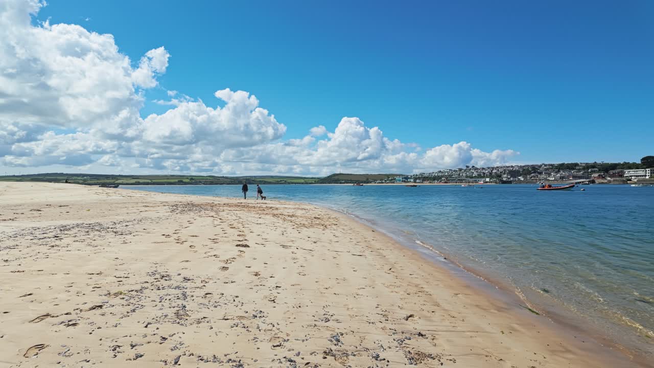 Pan from left to right looking across estuary towards Padstow