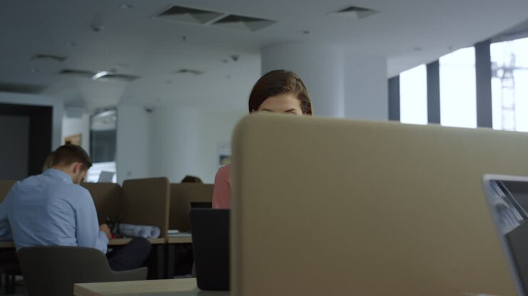 Businesswoman looking on laptop screen