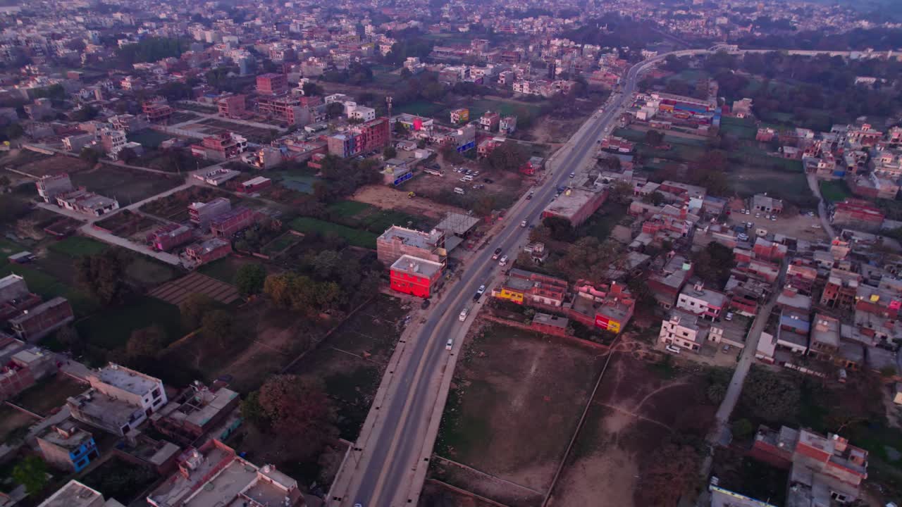 Independent houses with agricultural land and Ayodhya dham road, day time, push in, drone shot, 4k.